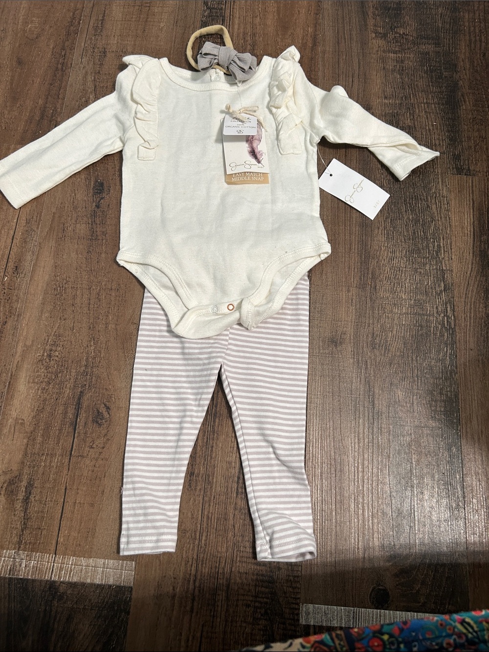 Jessica Simpson Cream Infant Bodysuit with Gold Logo